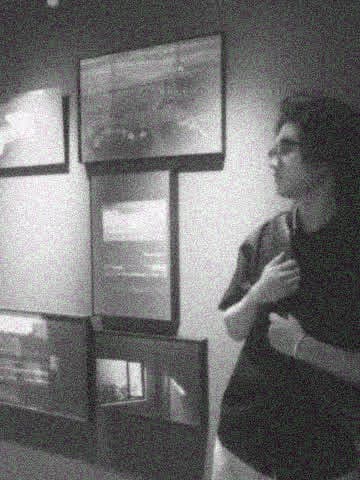 Yinghao Tang visiting a photography exhibition