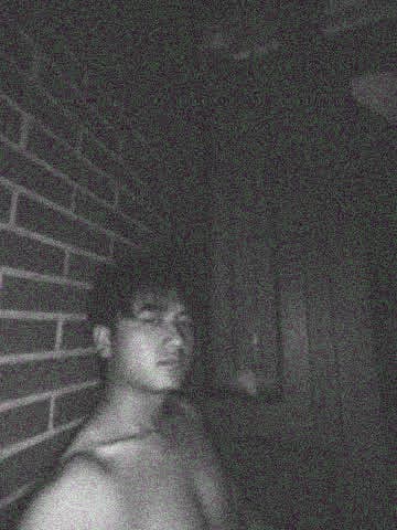 Yinghao Tang in a quiet dark room