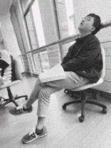 Yinghao Tang resting with a book